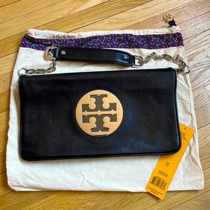 Never used Black Tory Burch Reva Clutch w/ protector on hardware